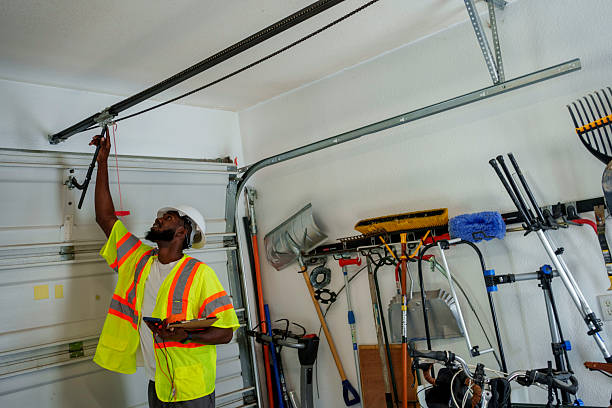 Professional Garage Door Maintenance technician working in Stewartville, MN